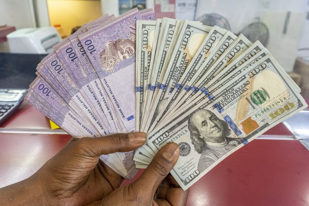 Strong trade data supports ringgit despite softer close against US dollar