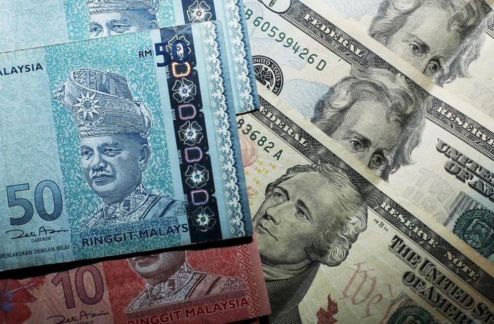 Ringgit little changed as markets price in possible December Fed hike