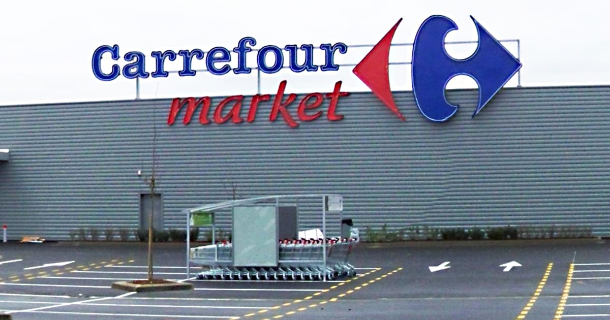Carrefour shares plunge after profit warning on French protests