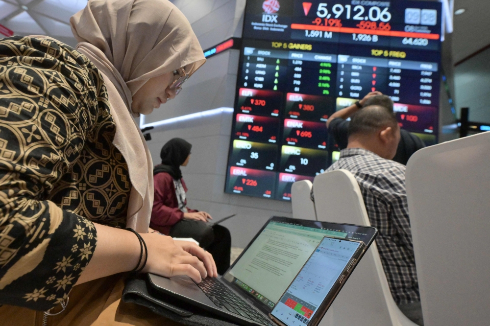 Indonesia lets listed firms buy back shares without shareholder approval until June 2027