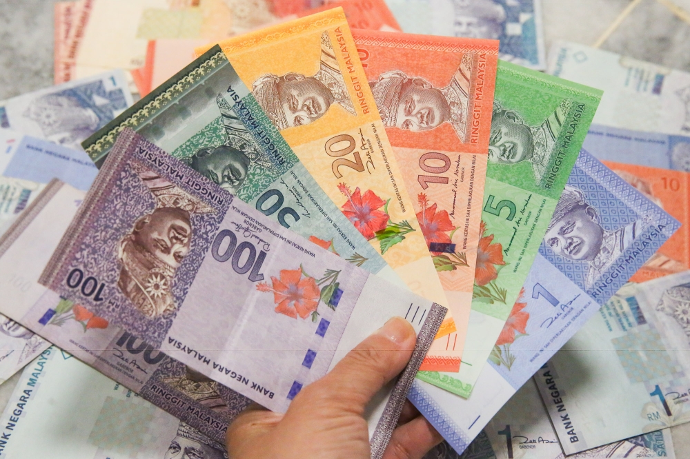 Ringgit mixed ahead of Fed decision, slips against US dollar